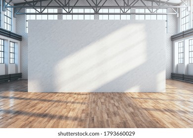 Large exhibition interior with empty concrete wall and wooden floor. Presentation concept. Mock up. 3D Rendering