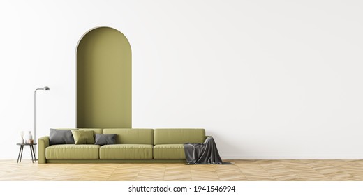 Large living room interior with a comfortable green sofa located on the oak wooden floor. White empty wall is divided by a tall arch. Bright minimalist style design. Mock up. 3d rendering