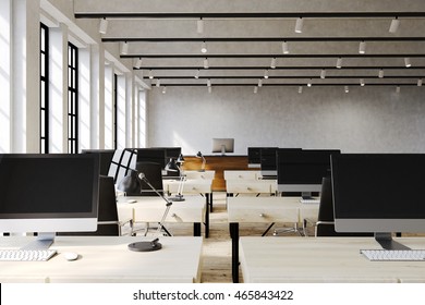 Large Office Room With Lots Of Computers On Wooden Desks. Concept Of Teamwork. 3d Rendering. Mock Up