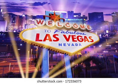 Las Vegas Showtime Concept. Illuminated City and Vegas Strip Welcome Sign. Famous City of Las Vegas, Nevada, United States.