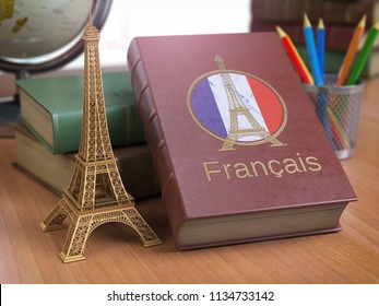 Learn and studiyng French concept. Book with  French flag and Eiffel tower on the table. 3d Iluustration