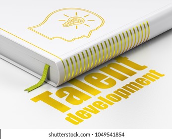 Learning concept: closed book with Gold Head With Lightbulb icon and text Talent Development on floor, white background, 3D rendering