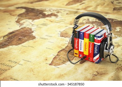 Learning languages online. Audiobooks concept. Books and headphones on the map world. 3d - Powered by Shutterstock