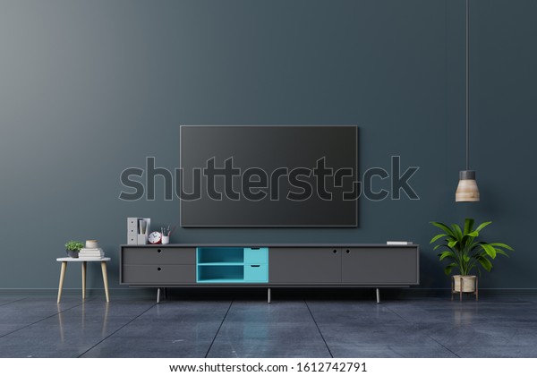 LED TV on the dark wall in living room,minimal\
design,3d rendering