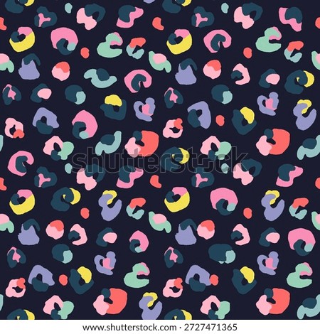 Leopard seamless pattern with colorful abstract spots on dark blue background