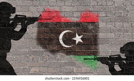 Libyan Map And Flag Painted On The Old Brick Wall. In The Background Left And Right Silhouettes Of Military Warriors