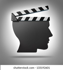 Life Direction And Human Guidance As A Symbol Of A Movie Equipment Clapboard Shaped As A Head Ins A Concept For Living And Taking Action In Your Biography.