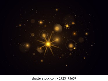 Light abstract glowing bokeh lights. Sparkling magical dust particles. The dust sparks and golden stars shine with special light on a black background.