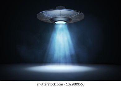 Light beam from flying UFO (alien spaceship). 3D rendered illustration.