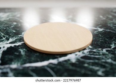 Light Coloured Wooden Round Stage On Top Of Dark Marble Counter. 3D Rendering