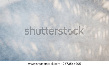 Light gray tie dye background with soft shadows and an abstract pattern, perfect for various design projects