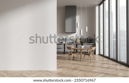 Light home kitchen interior with dining table and chairs, hardwood floor. Cooking space with cabinet, panoramic window on skyscrapers. Mock up empty wall partition. 3D rendering