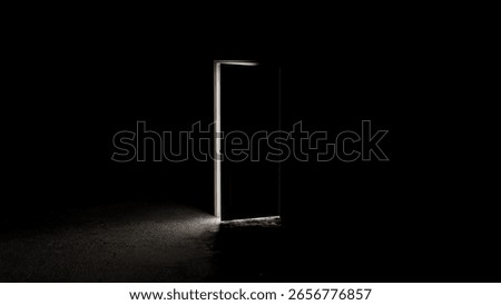 Light shining through an open door into a dark room, creating a bright beam on the floor, symbolizing hope, opportunity, or a new beginning