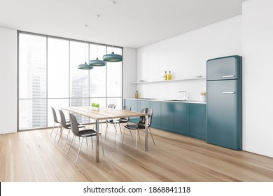 Light Wooden Dining Room With Blue Kitchen Set With Oven And Fridge, Side View. Dining Wooden Table With Six Black Chairs On Wooden Floor 3D Rendering, No People