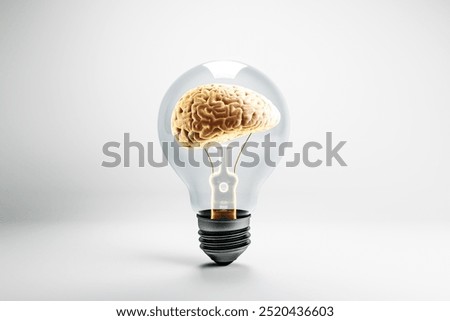 Lightbulb with a brain inside on a plain background, symbolizing idea generation, creativity, and intelligence. 3D Rendering