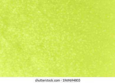 Lime Green Bokeh Lights, Showing a Scattering of Round Shapes of Similar Size.  