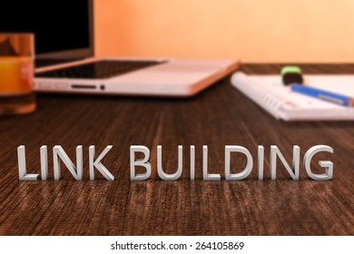 Link Building - letters on wooden desk with laptop computer and a notebook. 3d render illustration. - Powered by Shutterstock