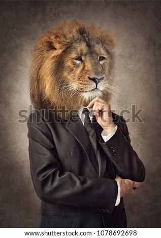Lion in a suit. Man with a head of an lion. Concept graphic in vintage style with soft oil painting style.  Stock photo © 