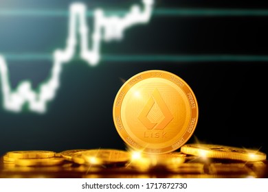 LISK (LSK) cryptocurrency; LISK golden coin on the background of the chart