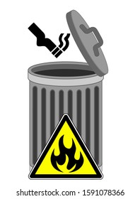 Lit Cigarette In Trash Can. Tossing Butts Into The Garbage Bin Can Cause Fire Hazard