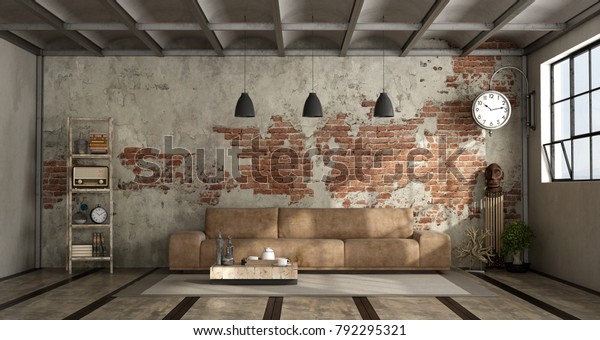 Living room in industrial style with leather\
sofa and brick wall - 3d\
rendering