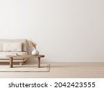 Living room interior mockup in wabi-sabi style with low sofa, jute rug and dried grass decoration on empty warm neutral wall background. 3d rendering, illustration.