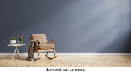 Living room interior mockup in warm tones with brown armchair on empty dark blue wall background.3d rendering