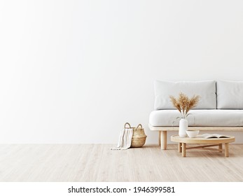 Living Room Interior Wall Mockup In Warm Neutrals With Low Sofa, Dried Pampas Grass On Caned Table And Japandi Style Decoration On Empty White Wall Background. 3D Rendering, Illustration.