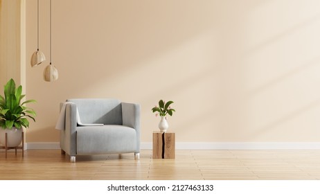 Living room interior wall mockup in warm tones with armchair on cream color wall background.3d rendering