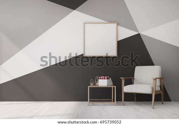 Living room interior with a white and black geometric pattern wall