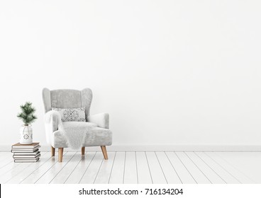 Livingroom interior with velvet armchair, pillow, pile of books and pine branch in vase on white wall background. 3D rendering.