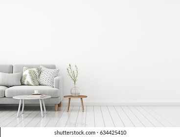 La pared interior de la sala de estar se burla con sofá de tela gris y almohadas sobre fondo blanco con espacio libre a la derecha.Representación 3d.