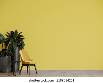 Livingroom Or Reception Lounge Room With A Cozy Yellow Mustard Chair. Small Black Coffee Table. Empty Wall Background For Art Painted In Yellow Ocher Color. Minimal Scene With Bright Tones. 3d Render