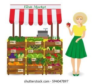 Local vegetable stall. Farmer woman produce shopkeeper.Fresh organic food products shop on shelves. Local market farmer selling vegetables produce on his stall with awning.  - Powered by Shutterstock