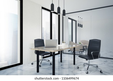 Loft office corner with a marble floor, white walls, a computer desk and a guest armchair. A close up 3d rendering mock up