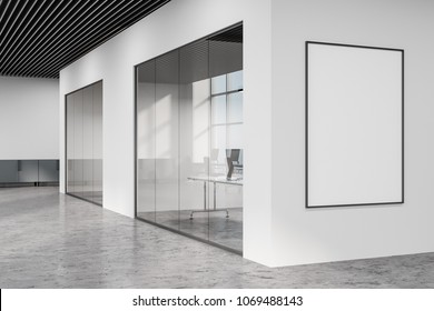 Loft Open Space Office Lobby With A Black Ceiling, A Concrete Floor, Glass Wall Rooms And A Framed Vertical Poster. 3d Rendering Mock Up