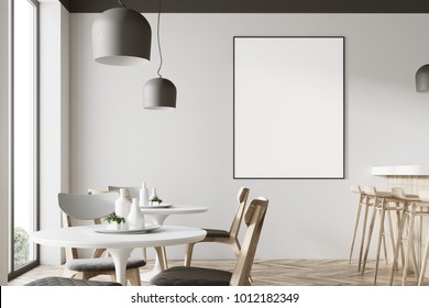 Loft Restaurant Interior With A Wooden Floor, Tall Windows And Gray And Wooden Chairs Near Round Tables. A Framed Poster. 3d Rendering Mock Up