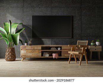 Loft Space Empty Room With Tv And Cabinet On Dark Concrete Interior Background.3d Rendering