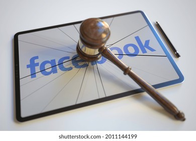 Logo Of Facebook On The Tablet Computer Screen Hit By Judge's Gavel. Court Related Editorial  3D Rendering