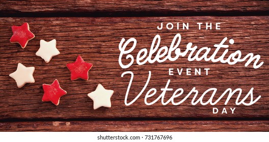 Logo for veterans day in america  against red and white cookies on table - Powered by Shutterstock