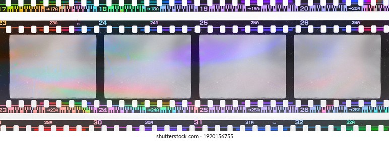 Long 35mm Negative Film Strip With Empty Or Blank Frames And Strange Scanning Light Interferences On The Material.