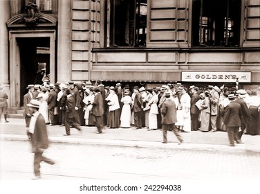 A Long Line Of Men And Women Line Up In A Run On The German American Bank Of New York City. Ca. 1905-1915.