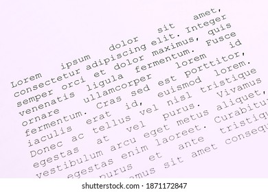 lorem ipsum dolor sit amet concept. selective focus photo of paper sheets with publishing and graphic design placeholder text on them.