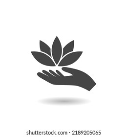 Lotus in hand icon with shadow