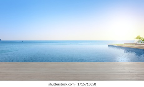 Lounge chair on terrace near swimming pool and garden in modern beach house or luxury villa. Hotel outdoor 3d rendering with sea view.