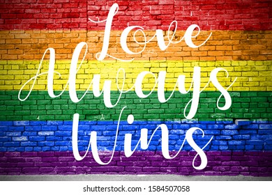 love always wins gay pride saying lettering Graffiti on Brick Wall