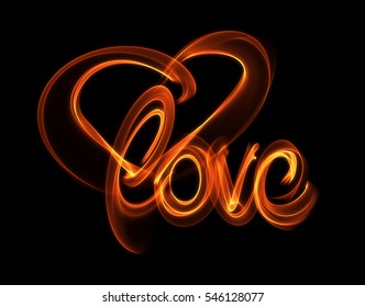 Love isolated word lettering   heart written and fire flame smoke black background 
