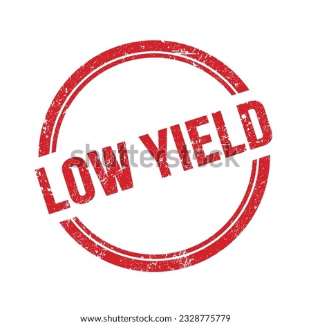 LOW YIELD text written on red grungy vintage round stamp.