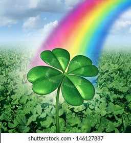 Luck Concept With A Four Leaf Clover Over A Field Of Green Clovers With A Rainbow From The Sky Shinning Down As A Symbol Of Good Fortune And Prosperity As A Metaphor For Success And Opportunity.