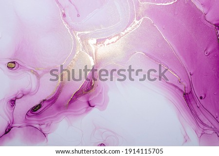 Luxury abstract fluid art painting in alcohol ink technique, mixture of pink and purple paints.  Imitation of marble stone cut, glowing golden veins. Tender and dreamy design. 